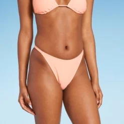 Women's Side Tab Extra Cheeky High Leg Bikini Bottom - Wild Fable™ 7 Women's Side Tab Extra Cheeky High Leg Bikini Bottom - Wild Fable™ -Wild Fable Shop GUEST b32eab92 a805 4c5c 9991 b3bcc933d5ad